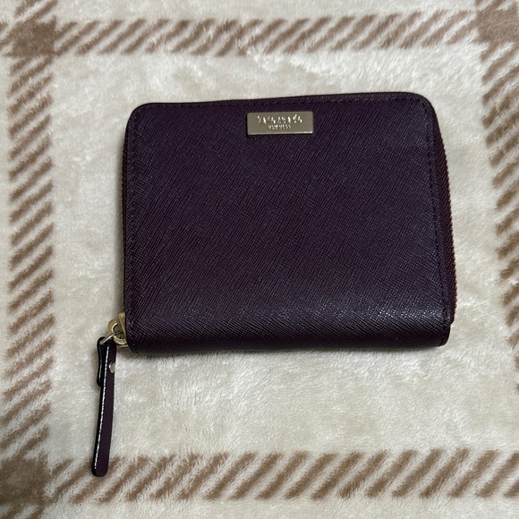 kate spade Handbags - EUC Kate Spade Burgundy Leather Zip Wallet with Gold Accents